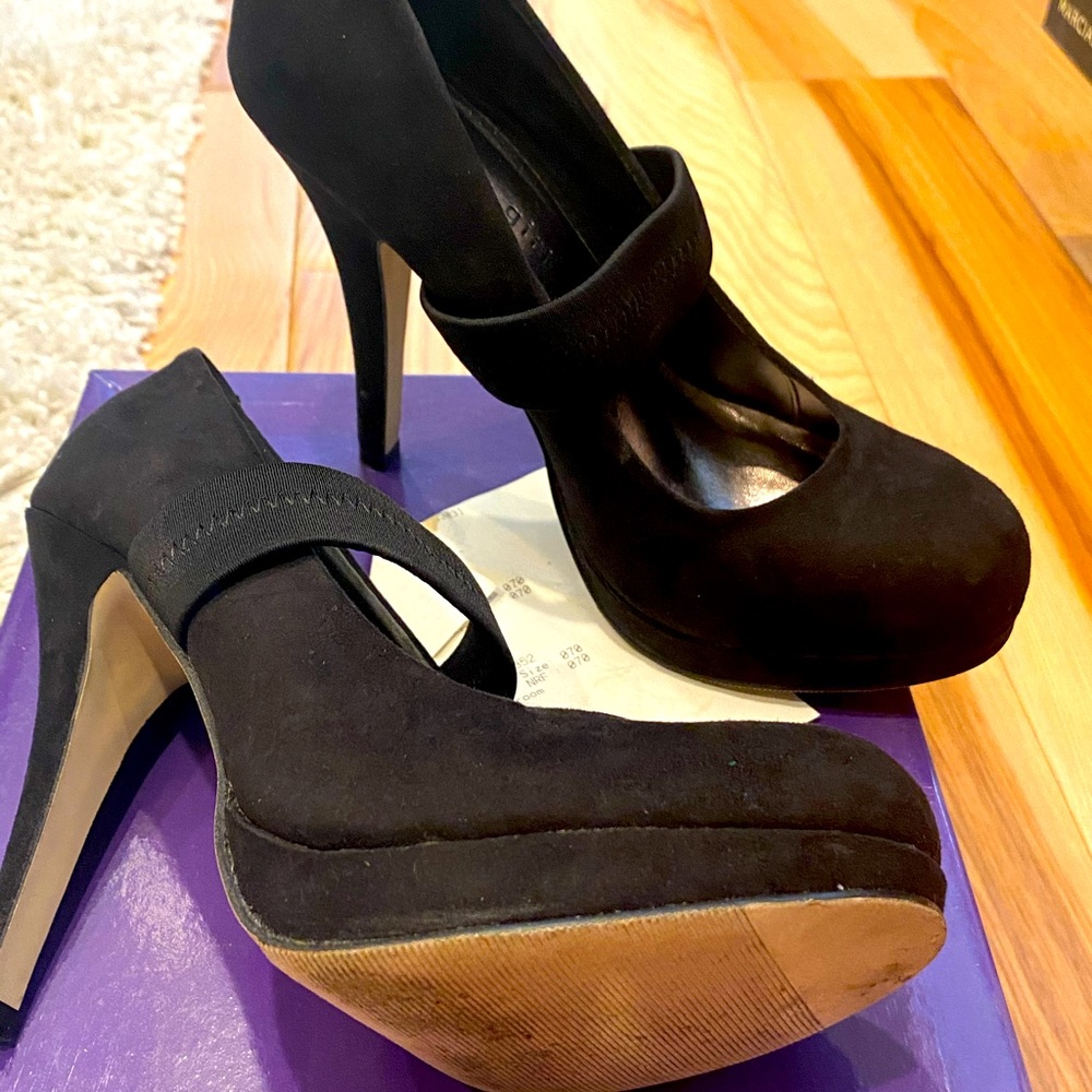 Black suede heels with platform toe
